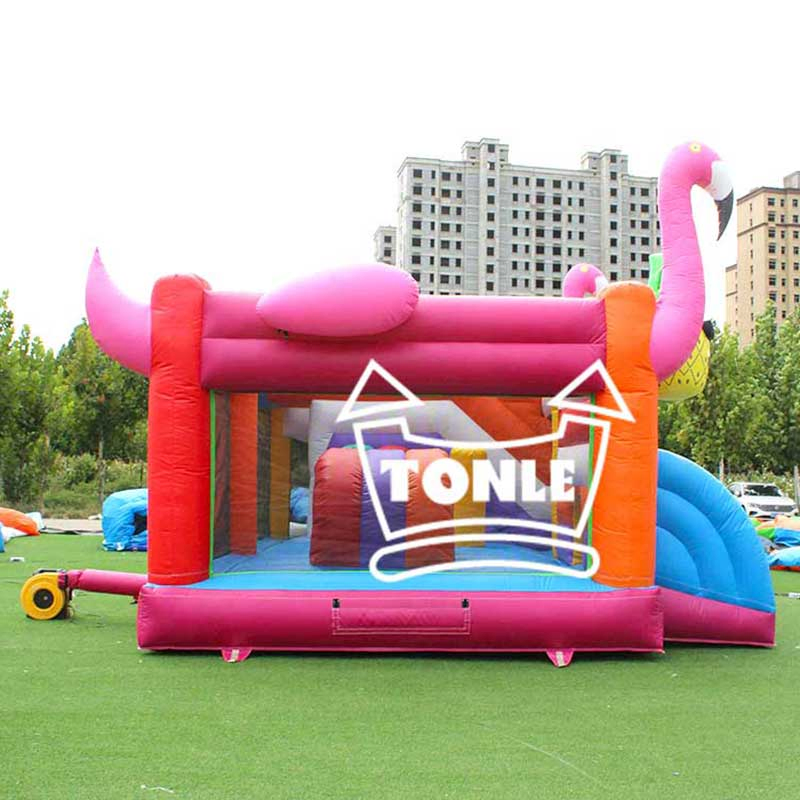 0.55mm PVC, Included Blower Flamingo Inflatable Bouncer with Slide – 5.5*5*4.2m, CE EN71, Custom, MOQ 1 Set
